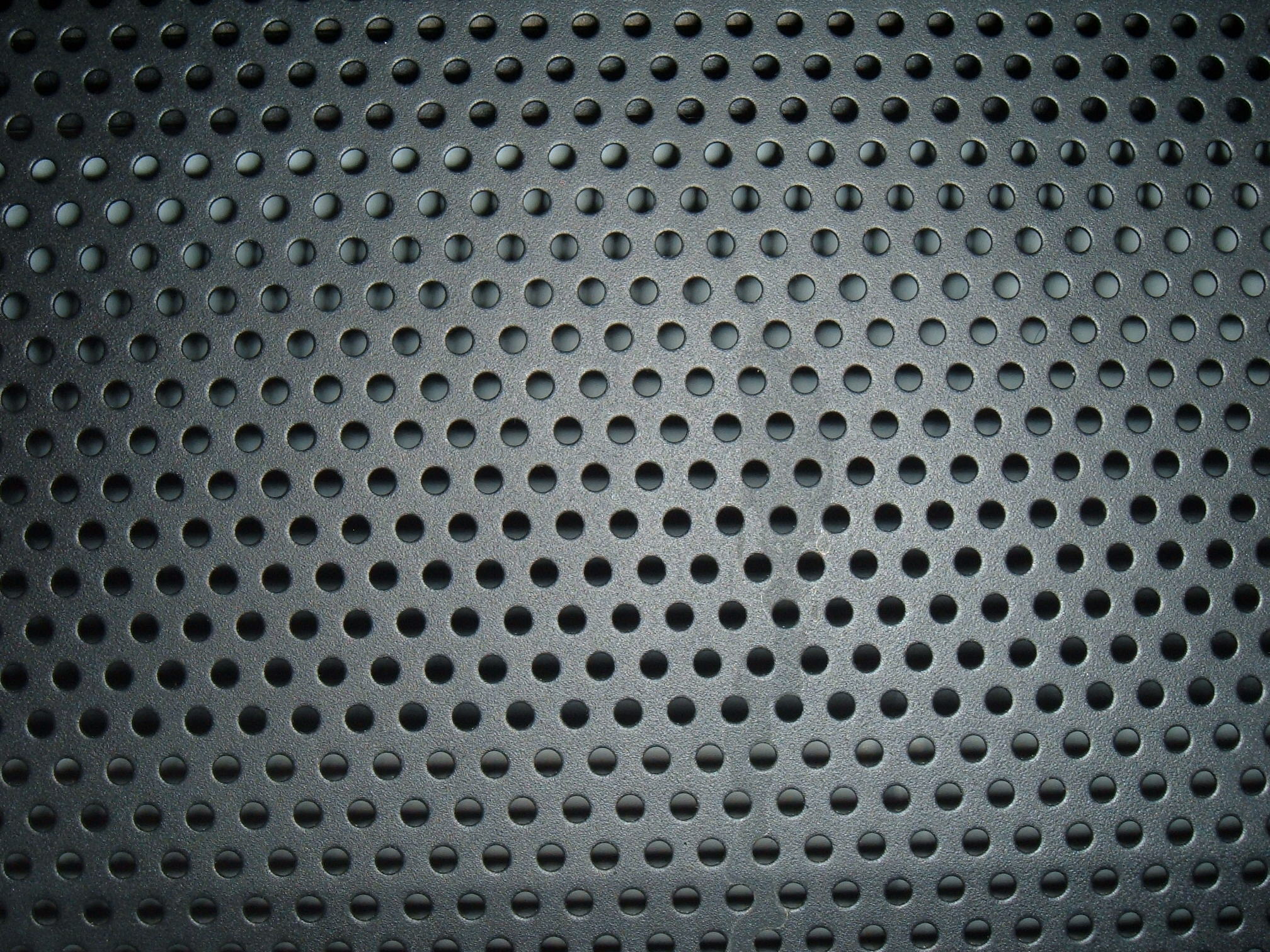 Chapa de acero con perforaciones circulares